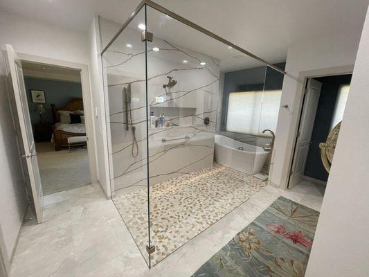 A gorgeous glass enclosure for this wet room.