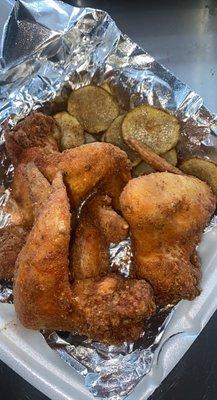 Chicken and fried potatoes