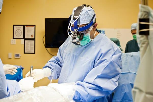 Dr. Edwin Haronian, M.D., performing Lumbar Micro-Decompression surgery.