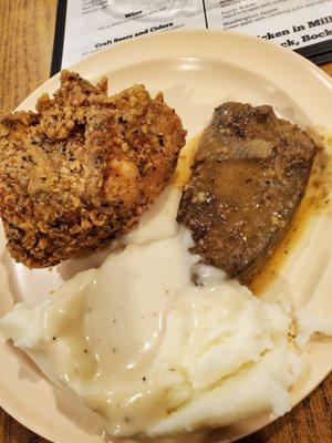 Fried chicken breast, mashed potatoes and gravy, beef liver and onions.