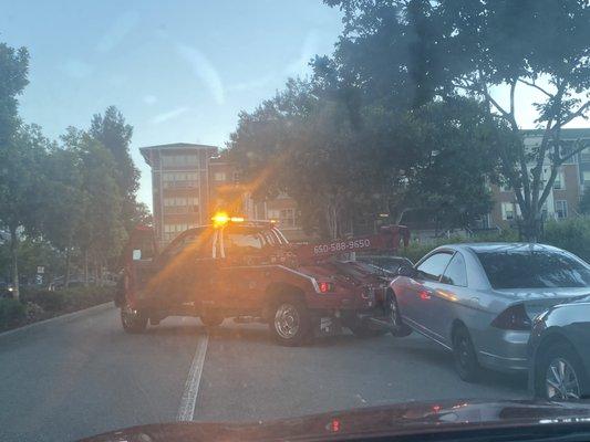 Car parked/ seas across from Tanforan Mall in the street parking of the apartment complex