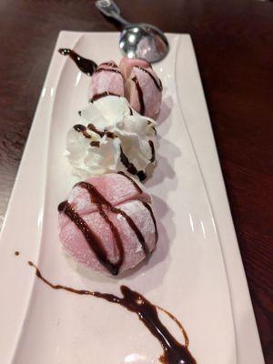 Strawberry mochi with an ice cream center (with whipped cream and chocolate)