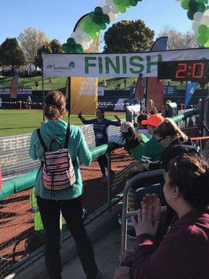 Me crossing the finish line