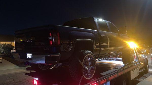 Show truck getting towed