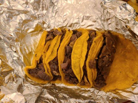 Lengua tacos minus cilantro and onions