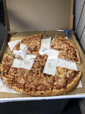 My co workers jumped in so quick I didn't get a shot of the pizza before many a slice was eaten! Scissors are to show scale!!