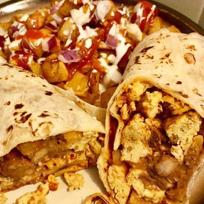 Breakfast burrito with chorizo egg with a side of potatoes