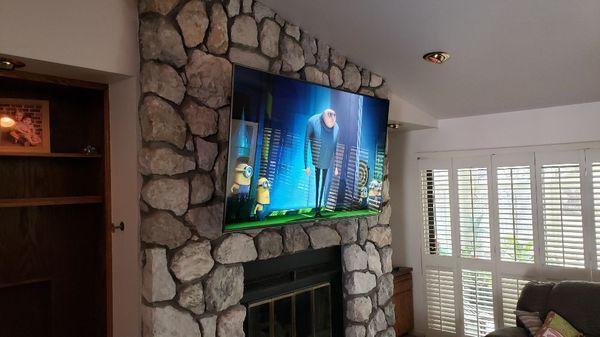 Beautiful, clean installation with cables hidden behind the TV.