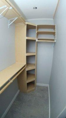 Team member Derek Stephenson built these custom closet shelves from scratch with no plans provided by the homeowner.