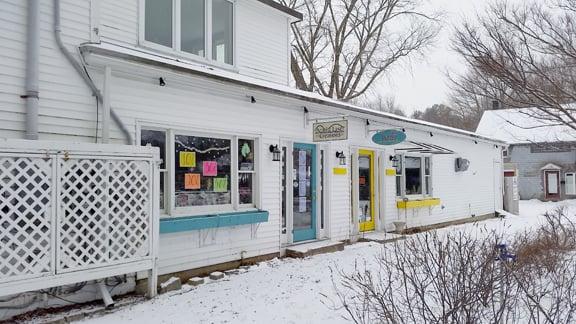 A photo of the shop's new location before repainting this spring.