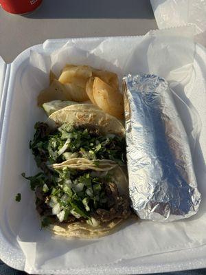 3 steak tacos and pork tamale.