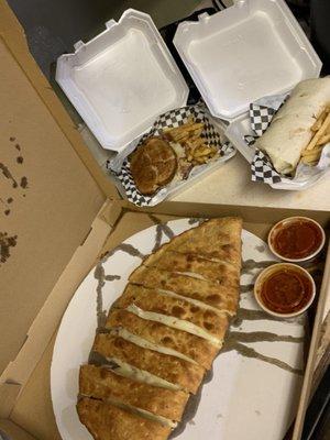 Take out. Large Stromboli, Reuben and pub wrap both with seasoned fries. Yum!