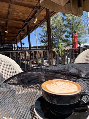 Latte w pistachio milk. Nice outdoor seating