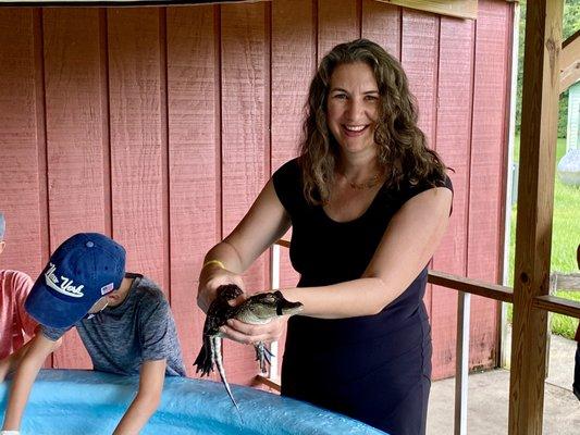 Well worth the extra fee to hold your own gator. half the fun is catching them yourselves.