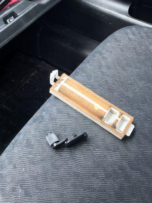 Filter cover and glove box lock found inside glovebox