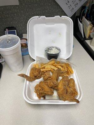 Chicken wings, fries, cole slaw and Diet Coke!