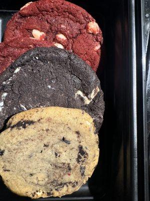 Red velvet cookie, cookies & cream cookie, and domino cookie