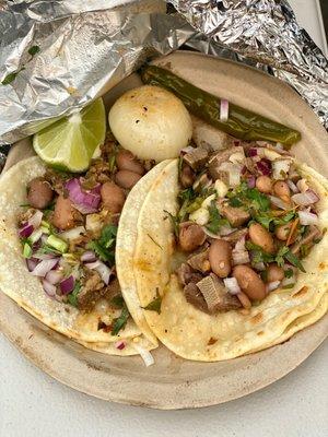 Tongue and Steak tacos.  Not sure why there's beans in there