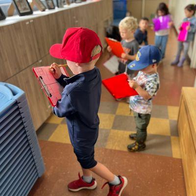 Preschoolers focusing on their architectural task.