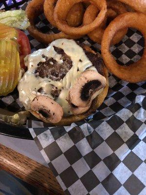 Swiss burger with uncooked mushrooms