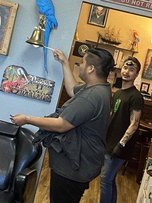 ringing the bell after getting his first tatt! THANK YOU JULES!!! @jules_thabeezkneez