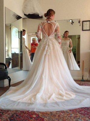 It gotta be a Calvet Coutour Bridal gown.