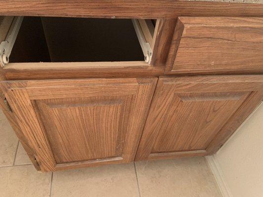 No cabinet drawer! Paint all through out ! Dirt in cabinets