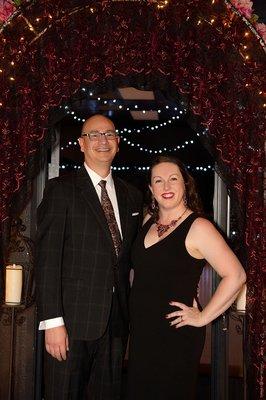 With my husband Jesus in front of the entrance to the main ballroom at Holiday Dance Studio.