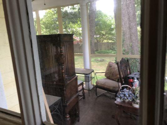 Antique furniture put outside that got wet during the storm the other day plus not put back when promised