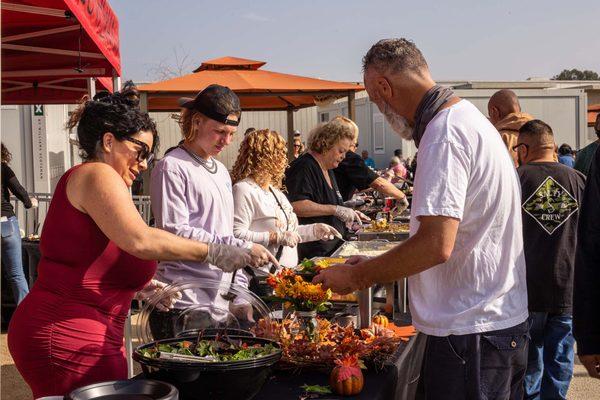 Salem members serve a delicious Thanksgiving meal to the residents of Salvation Army Adult Rehabilitation Center in Anaheim