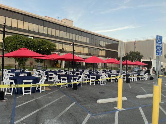 Umbrellas, tables, table cloths and chairs