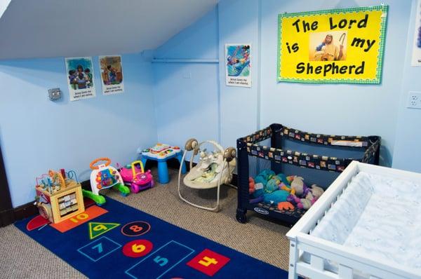 Little Lambs Room for newborn through two year old children.  Childcare allows you to be in the service, while your kid can be a kid.