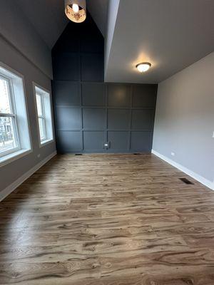 Accent wall, new Laminate flooring,and  window molding.