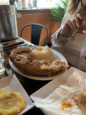 Fried "chillo" fish rice beans,tostones and salad. Yummy