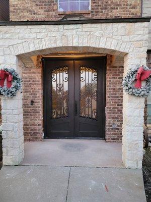 Replaced a wood door w this beautiful iron door