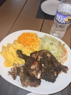 Half Jerk Chicken (Dark Meat) with Macaroni and Cheese (up-charge) and steamed veggies.