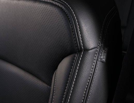 A silver stitch and perforated inserts add style and class to any leather upgrade