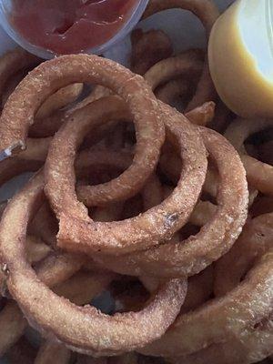 Cold HARD curly fries. I think they were old