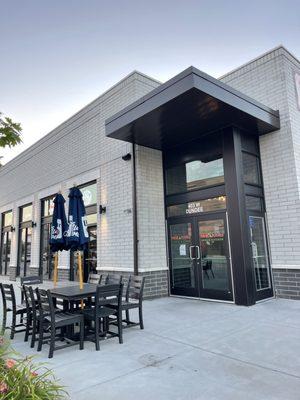 Back entrance and outdoor seating