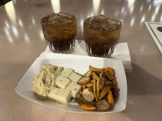 Happy Hour from 5:30 - 7:00 PM .. They now offer hummus as a snack for free :-) Free drinks as well .. Bourbon n Cokes