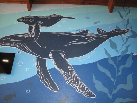 The inside has been painted with a beautiful ocean mural.