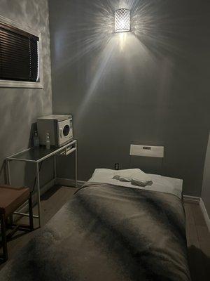 Clean quiet massage room.