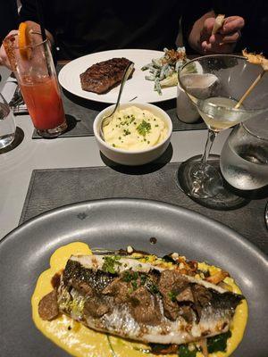 Drinks (from lt to rt): Blood Moon and Smooth Operator. Food (bk to frt): Simply Grilled 12 oz. Sirloin Steak and Lemon Branzino + Corn