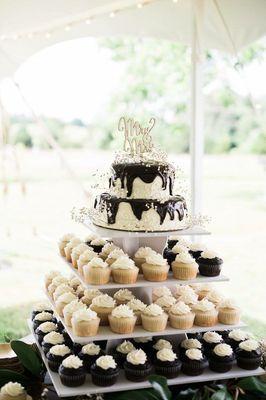 Wedding cake plus cupcakes