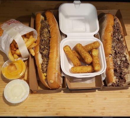 2 Cheesesteaks w fried onions (Cheese wiz, Amer wiz) Mozzarella sticks, Lg fries, side of Amer wiz. Delicious..