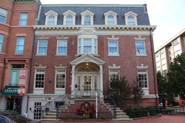 Our beautiful office, a modern space housed within a preserved historic building, conveniently located right off DuPont Circle.