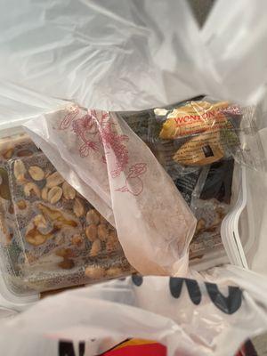 Inside the to go bag - Kung Pao chicken... they give you egg roll and fortune cookie and carry out soy sauce packet