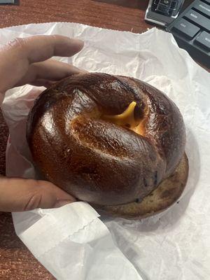 Burnt ass bagel hard as a rock this is ridiculous honestly don't go here! Can't even eat it.