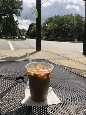 Caramel ice latte and the streets view on the front patio.