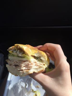 Turkey and provolone cheese sandwhich. This was delicious!! And you get to pack on your own condiments and pickles!